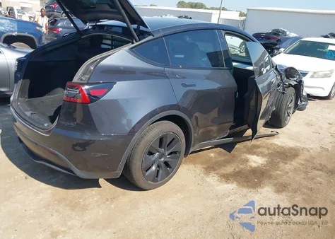2025 Tesla Model Y Long Range Dual Motor All-Wheel Drive z USA, uszkodzony, nr VIN 7SAYGDEE9SF248703